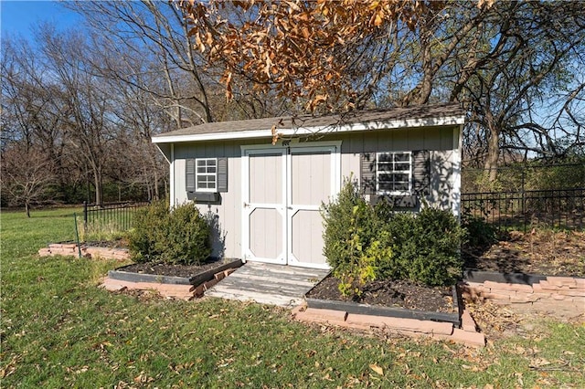 view of outdoor structure featuring a yard