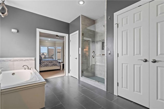 bathroom featuring shower with separate bathtub and ceiling fan