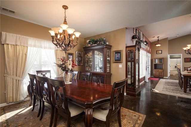 dining room with lofted ceiling and a notable chandelier