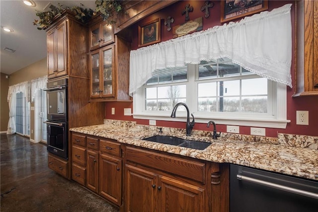 kitchen with double oven, a wealth of natural light, dishwasher, and sink