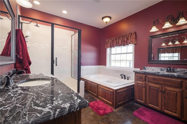 bathroom with vanity, concrete flooring, and plus walk in shower