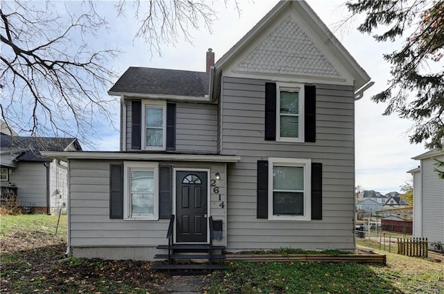 view of front of home with a front yard