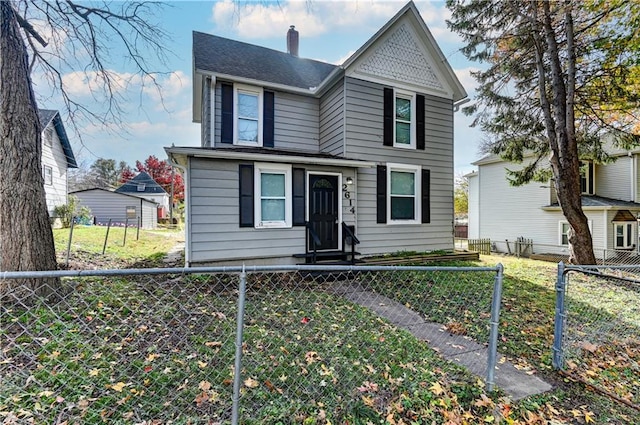 view of front of home with a front yard