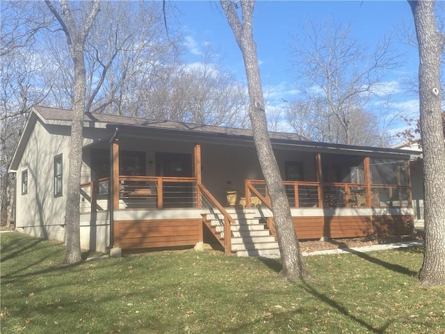 view of front of home featuring a front lawn