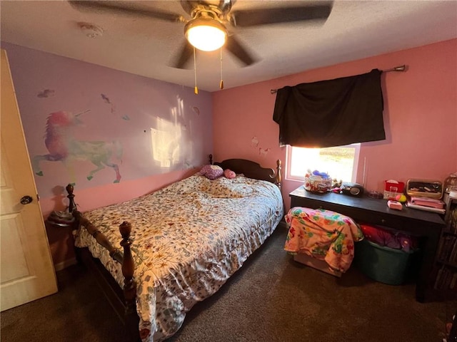 bedroom featuring dark carpet and ceiling fan