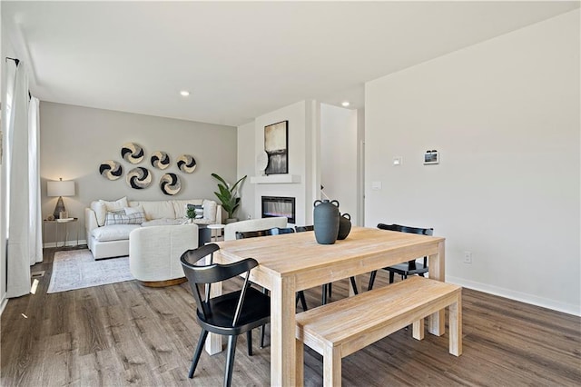 dining room with hardwood / wood-style floors