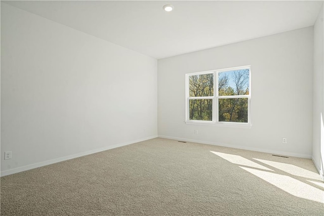 view of carpeted spare room