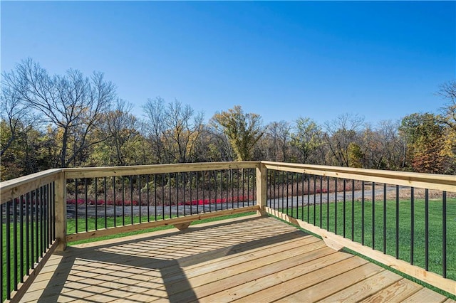 deck featuring a yard