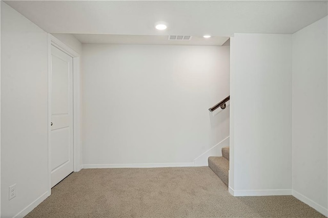 stairway with carpet floors