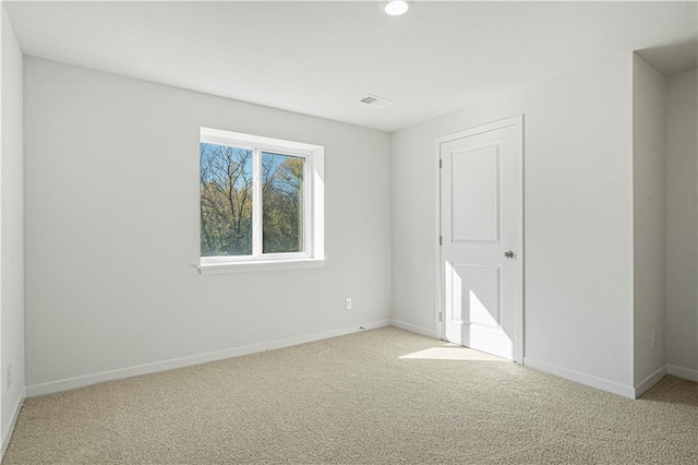 view of carpeted spare room