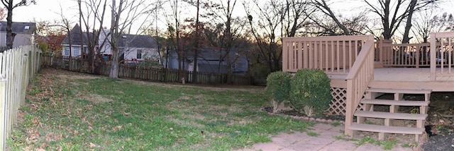 view of yard with a deck