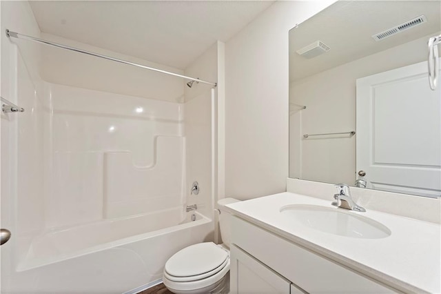 full bath with toilet, washtub / shower combination, vanity, and visible vents