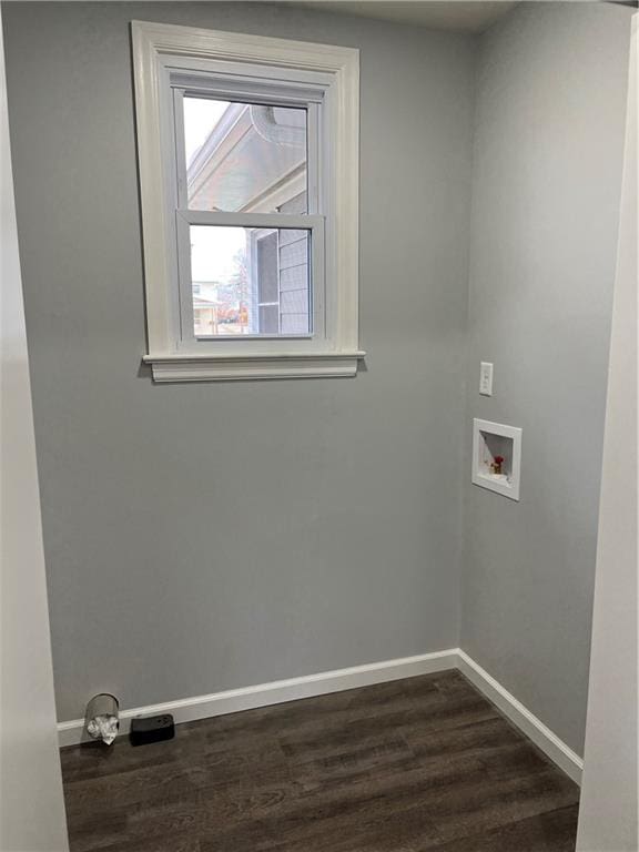 laundry room with washer hookup and dark hardwood / wood-style floors