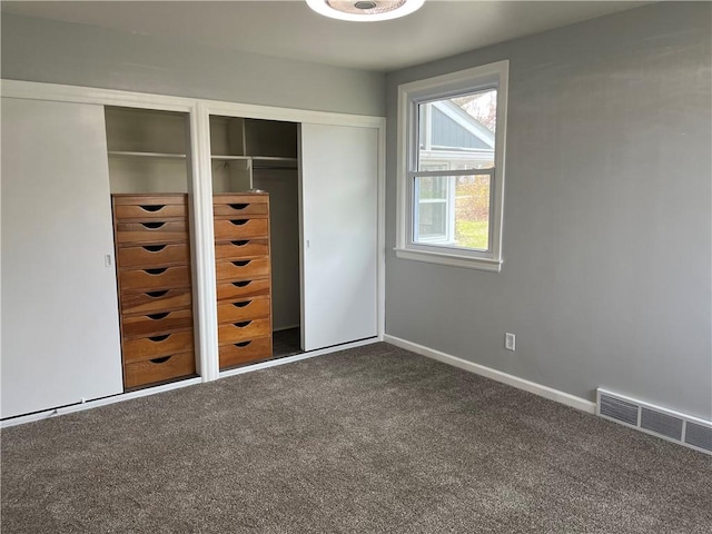 unfurnished bedroom with carpet flooring