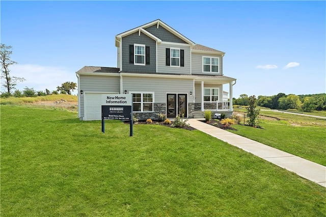 craftsman-style house featuring a porch and a front yard