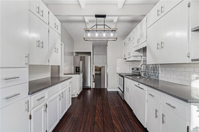 kitchen with hanging light fixtures, dark hardwood / wood-style flooring, beamed ceiling, white cabinets, and appliances with stainless steel finishes