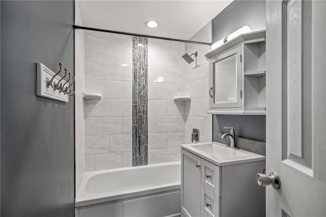 bathroom featuring vanity and shower / bath combination with curtain