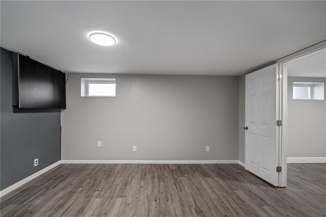 basement featuring hardwood / wood-style flooring