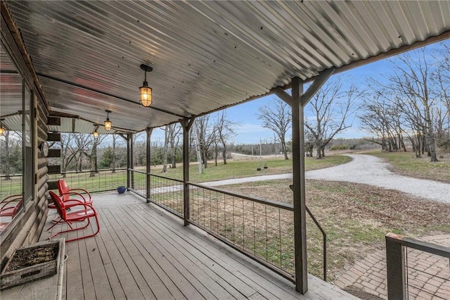 wooden terrace with a porch