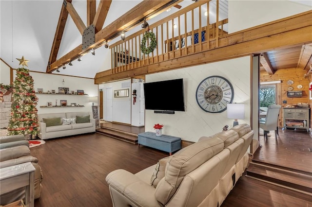 living room featuring wood walls, dark hardwood / wood-style flooring, beamed ceiling, and high vaulted ceiling