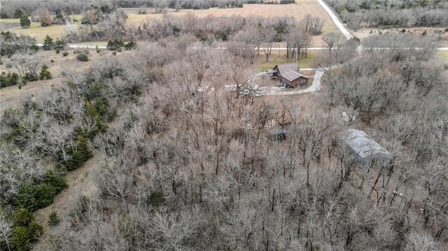 birds eye view of property featuring a rural view