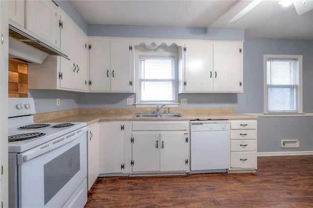 kitchen with white appliances, sink, dark hardwood / wood-style floors, ceiling fan, and white cabinetry