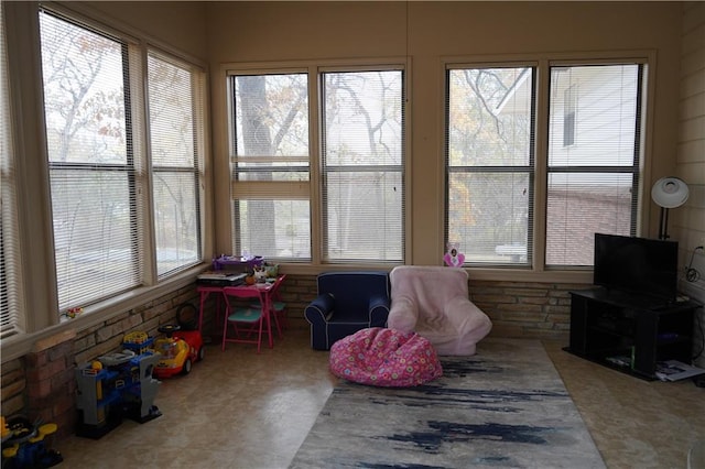 sunroom featuring a wealth of natural light