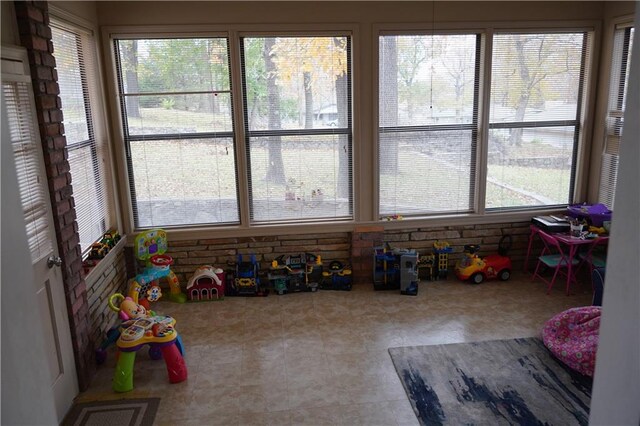 sunroom / solarium with a healthy amount of sunlight