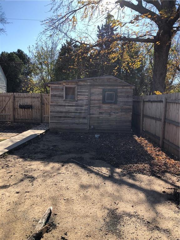 2720 Patee St, Saint Joseph, MO 64507 - view of shed featuring a fenced backyard and a gate