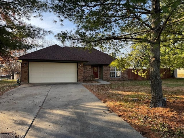 single story home with a garage