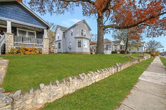 view of yard with a porch