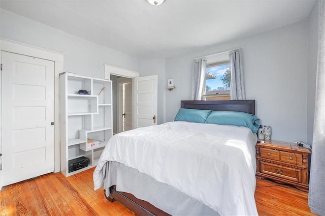 bedroom with light wood-style flooring
