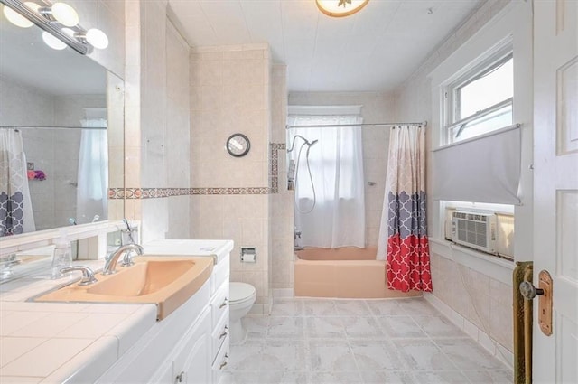 bathroom with cooling unit, tile walls, shower / bathtub combination with curtain, toilet, and vanity