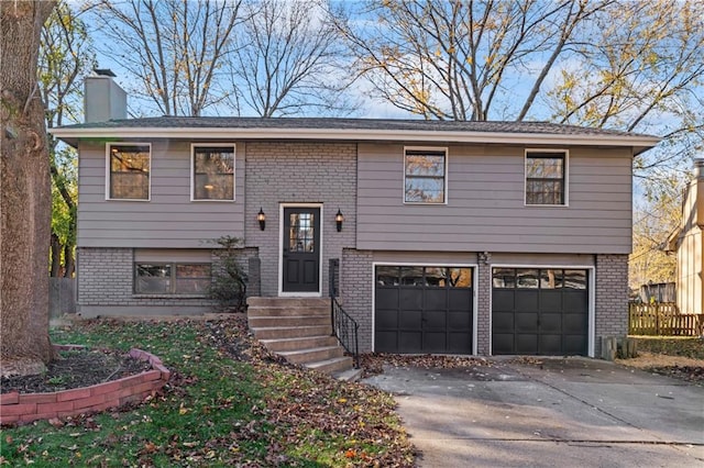 bi-level home featuring a garage