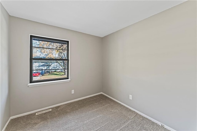 view of carpeted spare room