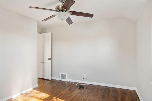 empty room featuring wood-type flooring, vaulted ceiling, and ceiling fan