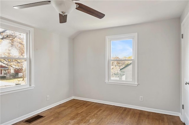 interior space featuring ceiling fan, lofted ceiling, and hardwood / wood-style floors