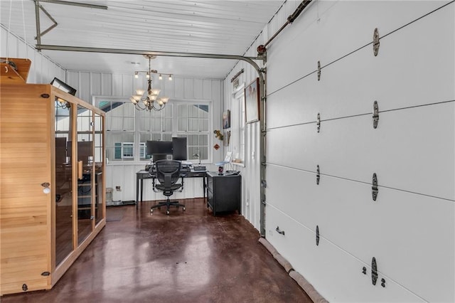 unfurnished office with wood walls and a notable chandelier