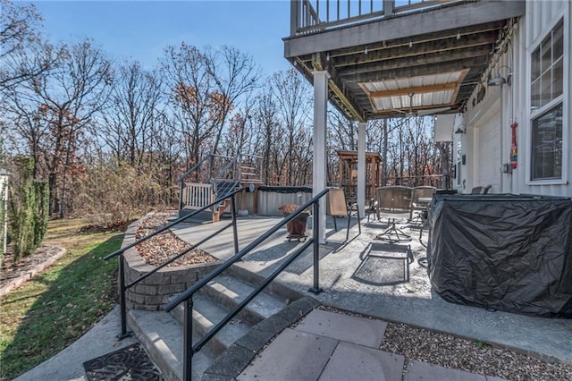 view of patio / terrace featuring a hot tub