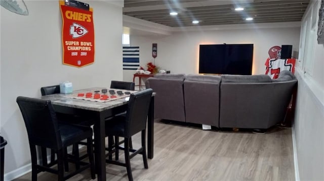 dining room with light hardwood / wood-style flooring