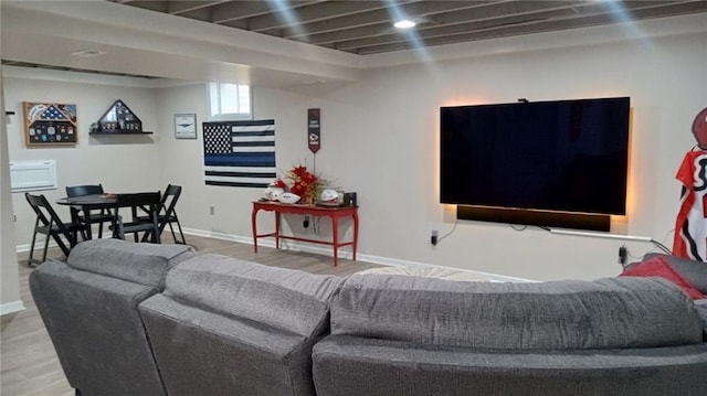 living room with light hardwood / wood-style floors