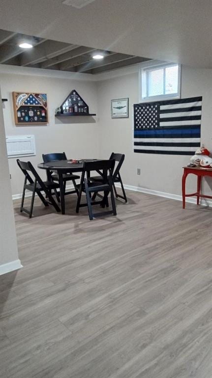 dining space with light hardwood / wood-style flooring