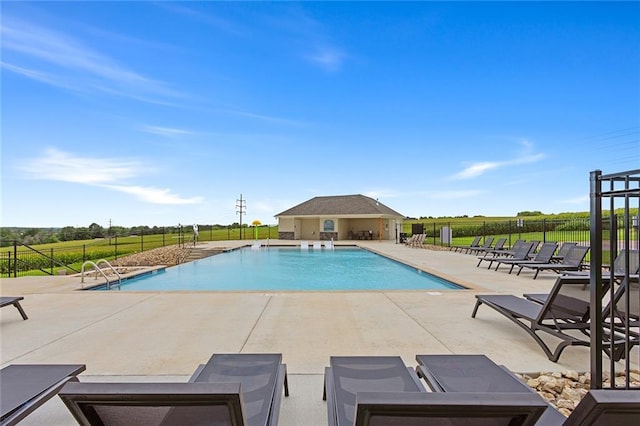 view of pool featuring a patio