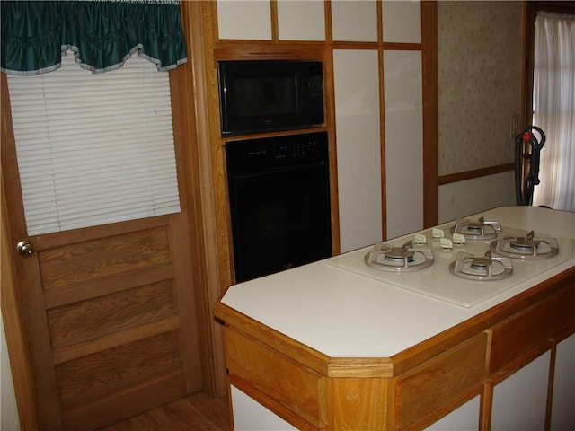 kitchen featuring black appliances