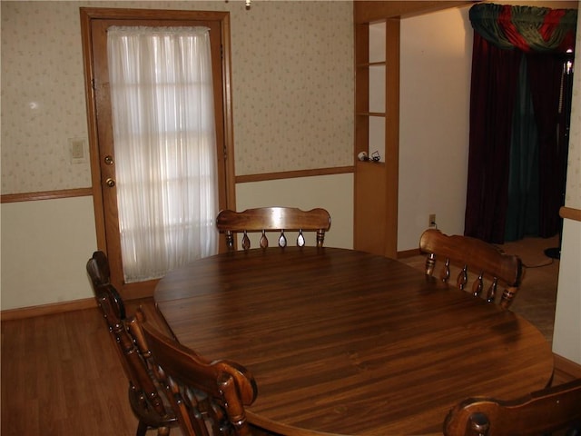 dining space featuring hardwood / wood-style flooring