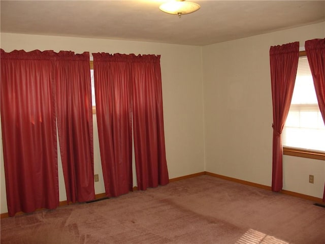 view of carpeted spare room