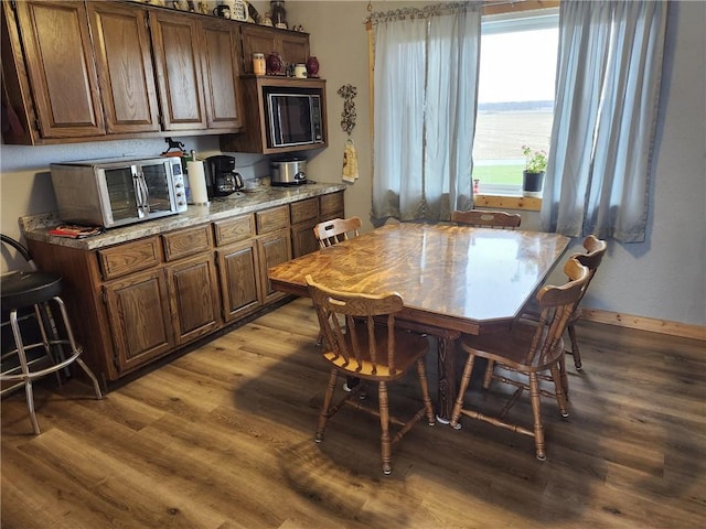 dining room featuring hardwood / wood-style flooring