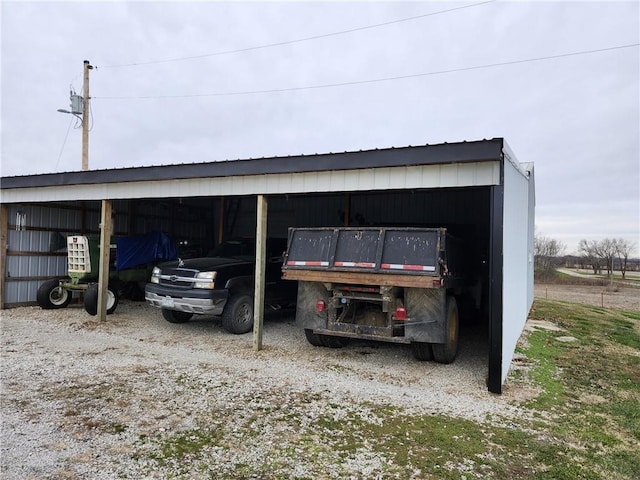 exterior space featuring a carport