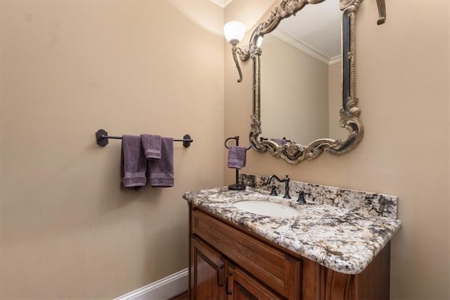 bathroom featuring vanity and crown molding