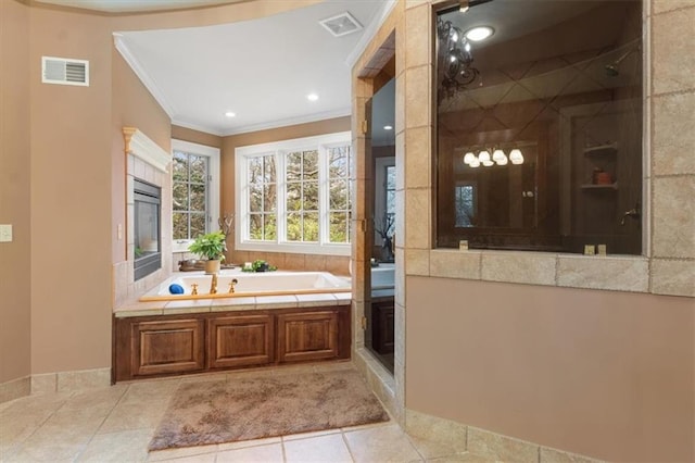 bathroom with crown molding, tile patterned flooring, and independent shower and bath